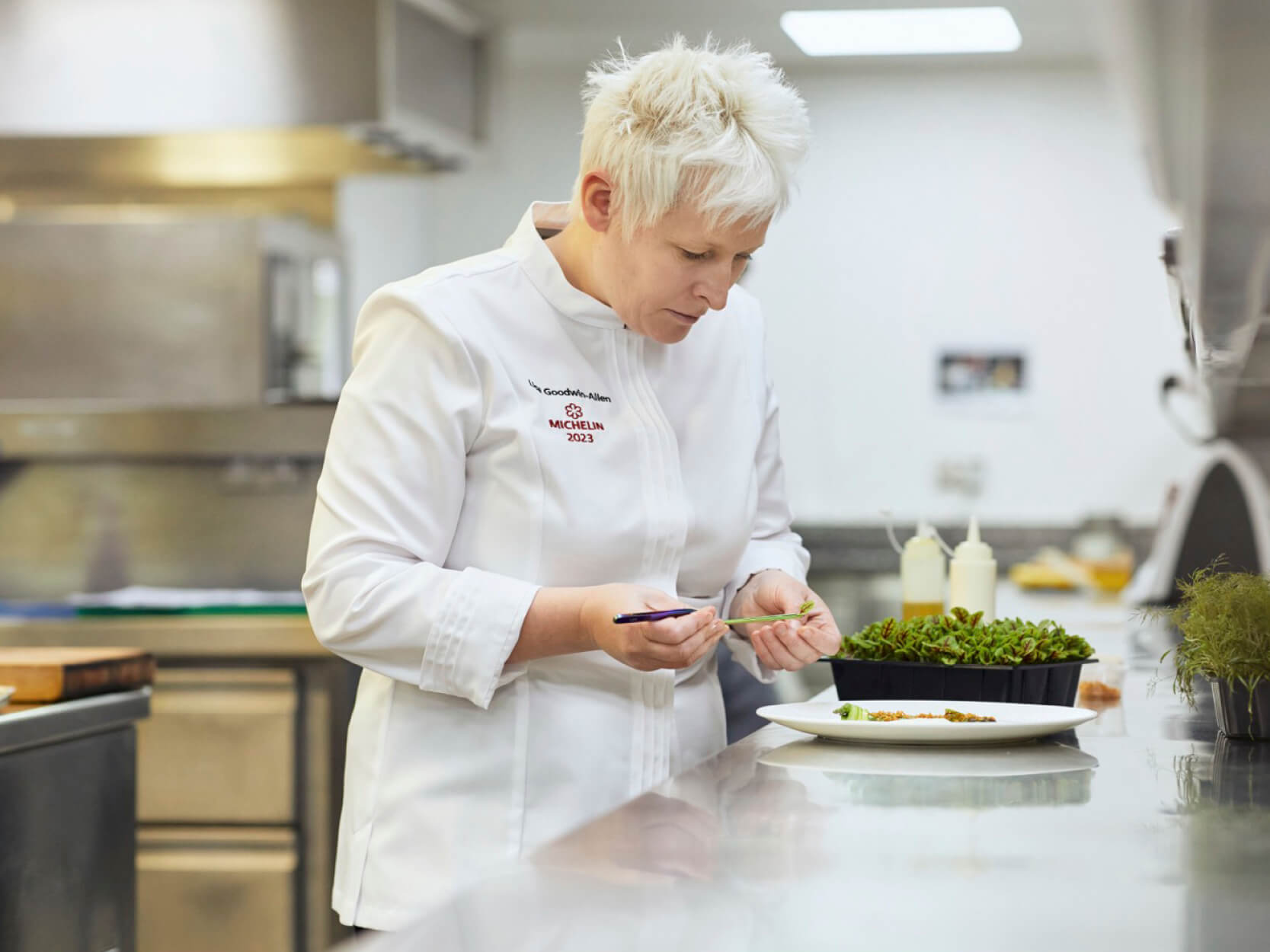 Executive chef of Michelin Star restaurant Northcote and reguklar judge on MasterChef Lisa Goodwin-Allen in the kitchen cooking